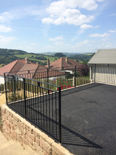 A neat, crisp angular black metal railing we created from scratch (by Derbyshire Dales Engineering)