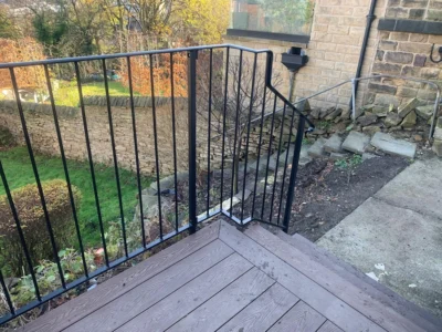 bespoke safety railings to the rear of a house (view from by them)