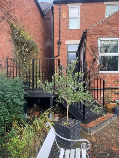 black painted iron railings and steps (domestic property)
